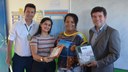 Entrega de livros na Unidade Escolar Florentino Martiniano Pereira